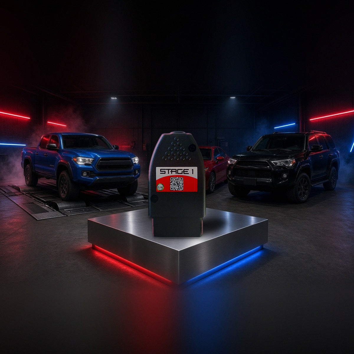 Stage 1 performance chip on a pedestal with a Toyota Tacoma, Camry and 4Runner in a dyno shop