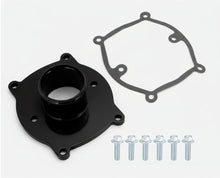Black mechanical component with gasket and screws on a white background