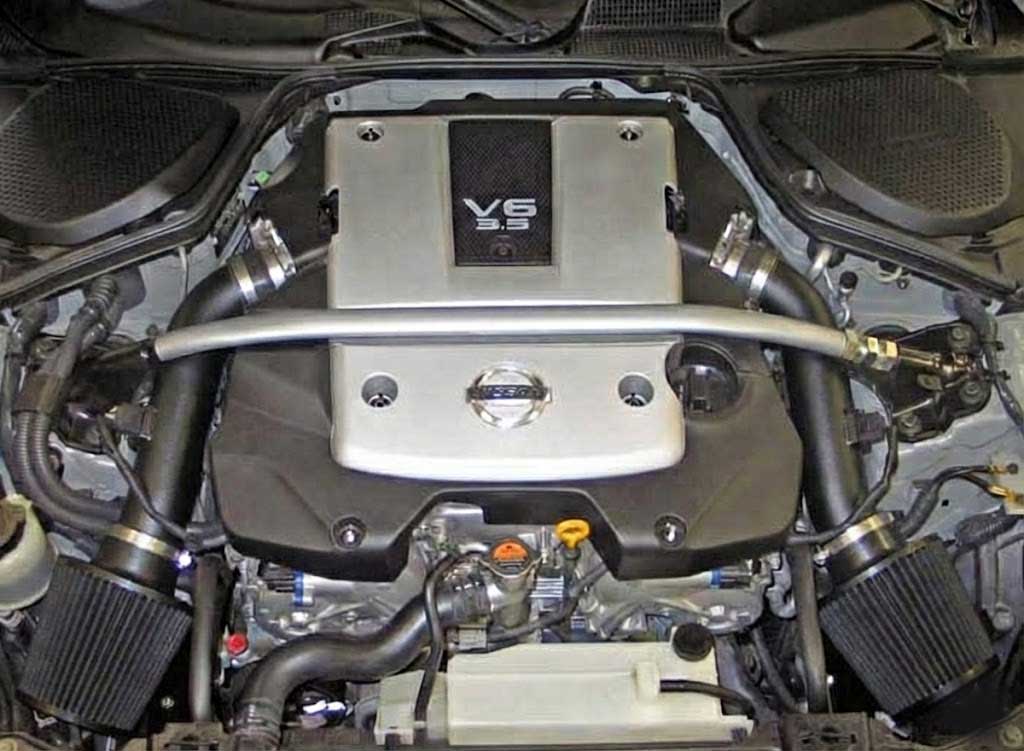Close-up of a car engine with a prominent 'YSS' brand logo.