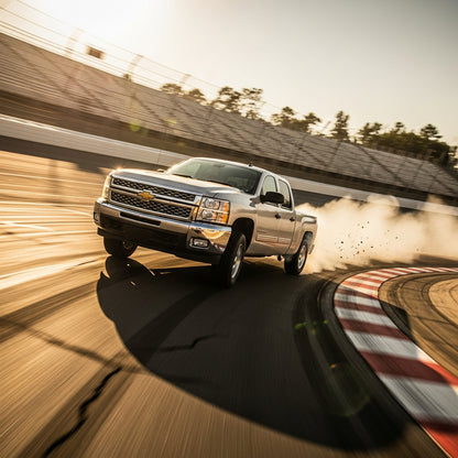 Action Shot: Chevrolet, GMC Sierra, Silverado Driving Fast