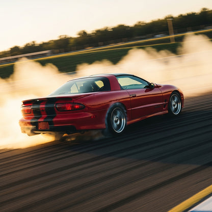 Action Shot: Chevrolet, Pontiac Camaro, Firebird Driving Fast