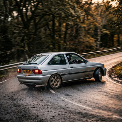 Action Shot: Ford Escort Driving Fast