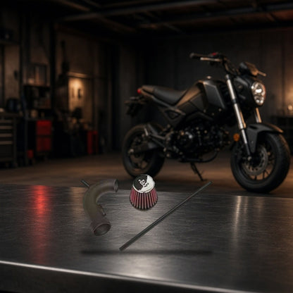 Short Ram Air Intake for Honda GROM SF (2013-2020) on a garage workbench