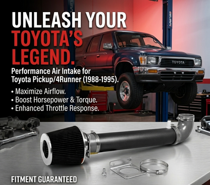 Toyota pickup truck with performance air intake system on a workshop background