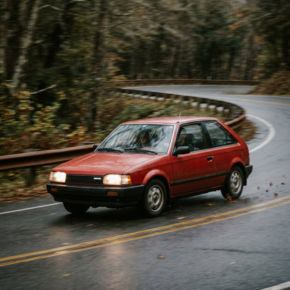 Action Shot: Mazda 323 Driving Fast