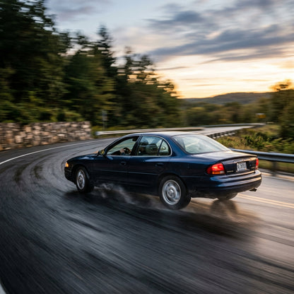 Action Shot: Oldsmobile Intrigue Driving Fast