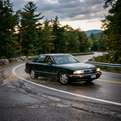 Action Shot: Oldsmobile Regency Driving Fast