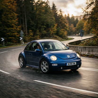 Action Shot: Volkswagen Beetle,Golf,Jetta Driving Fast