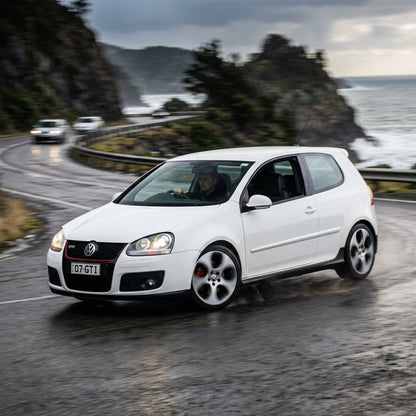Action Shot: Volkswagen Golf GTI Driving Fast