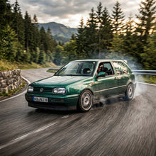 Action Shot: Volkswagen Golf,Jetta Driving Fast