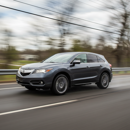 A square image of a Acura RDX 2013 driving fast showing speed