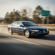 a square image of a Dodge Intrepid (1993-2004) driving fast showing speed
