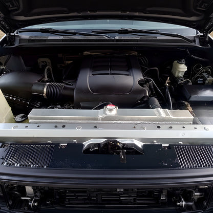 Aluminum performance radiator installed in a 2007-2020 Toyota Tundra 5.7L V8 engine bay, front view