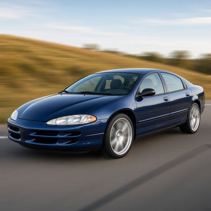 Blue 2003 Dodge Intrepid sedan with large aftermarket wheels driving fast