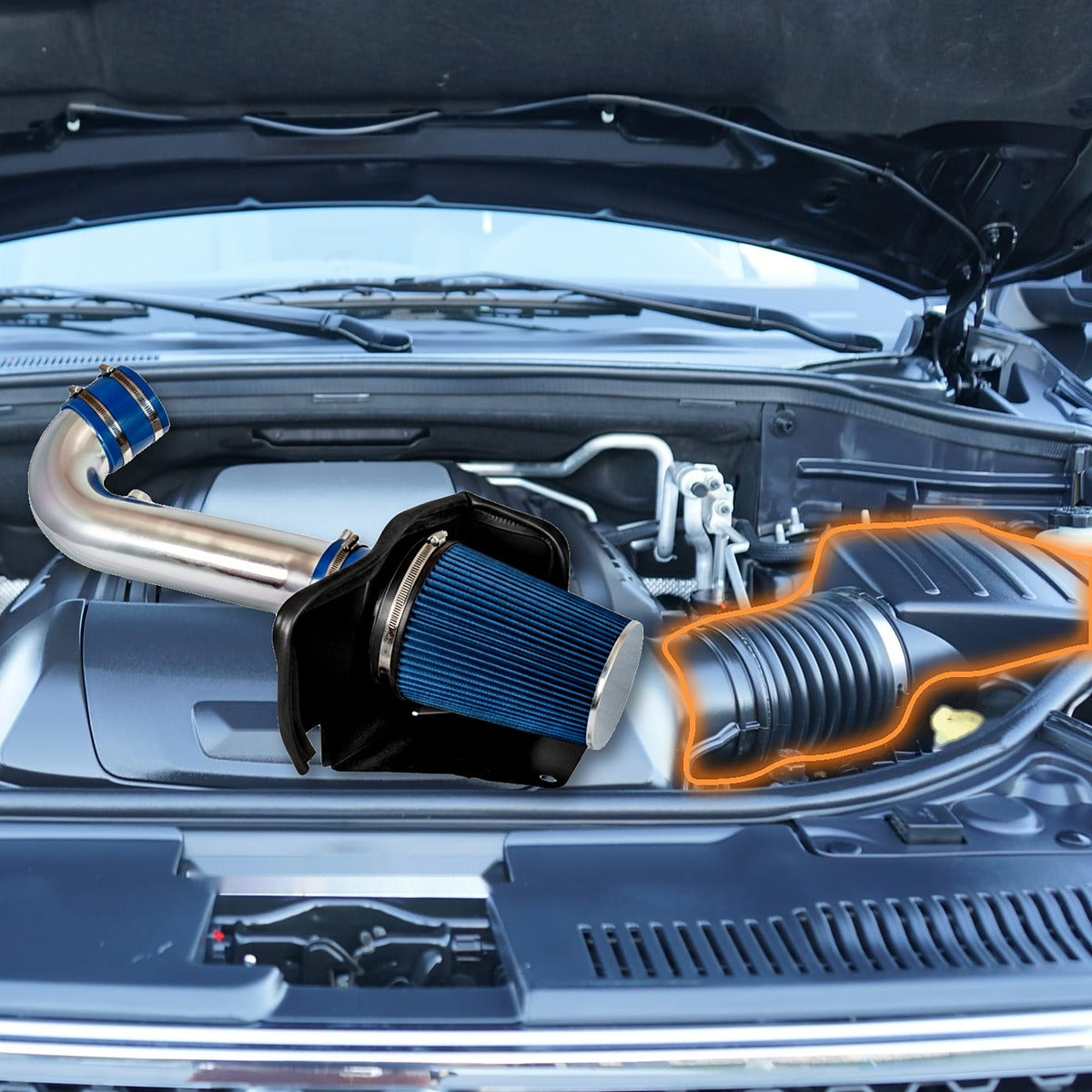 Dodge Durango 5.7L HEMI engine bay with the stock airbox and intake hose highlighted, and the cold air intake kit shown at scale