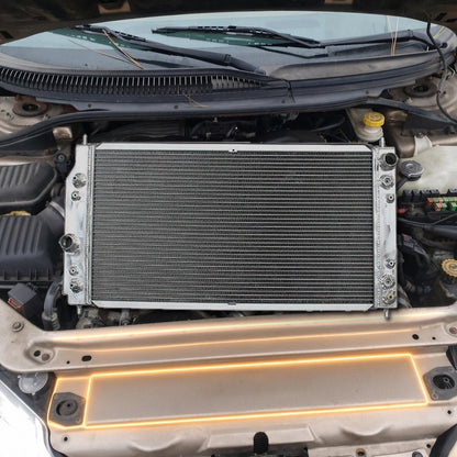 2002 Dodge Intrepid 3.5 V6 engine bay with the radiator area highlighted and the aluminium radiator that fits it