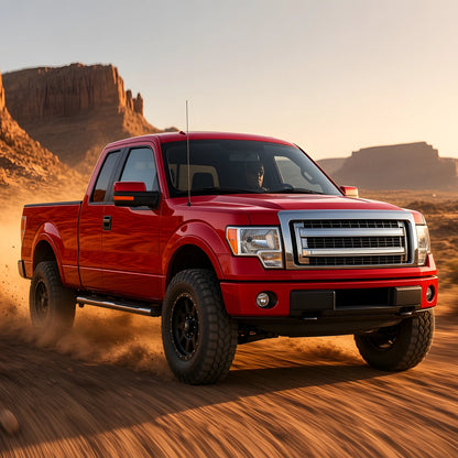 Red 2011-2014 Ford F-150 5.0L driving on a desert trail