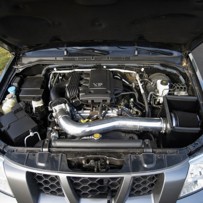Cold air intake installed in a Nissan Frontier 4.0L V6 engine bay