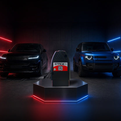 Stage 1 performance chip on a pedestal with a Range Rover Sport and Land Rover Defender in a dyno shop