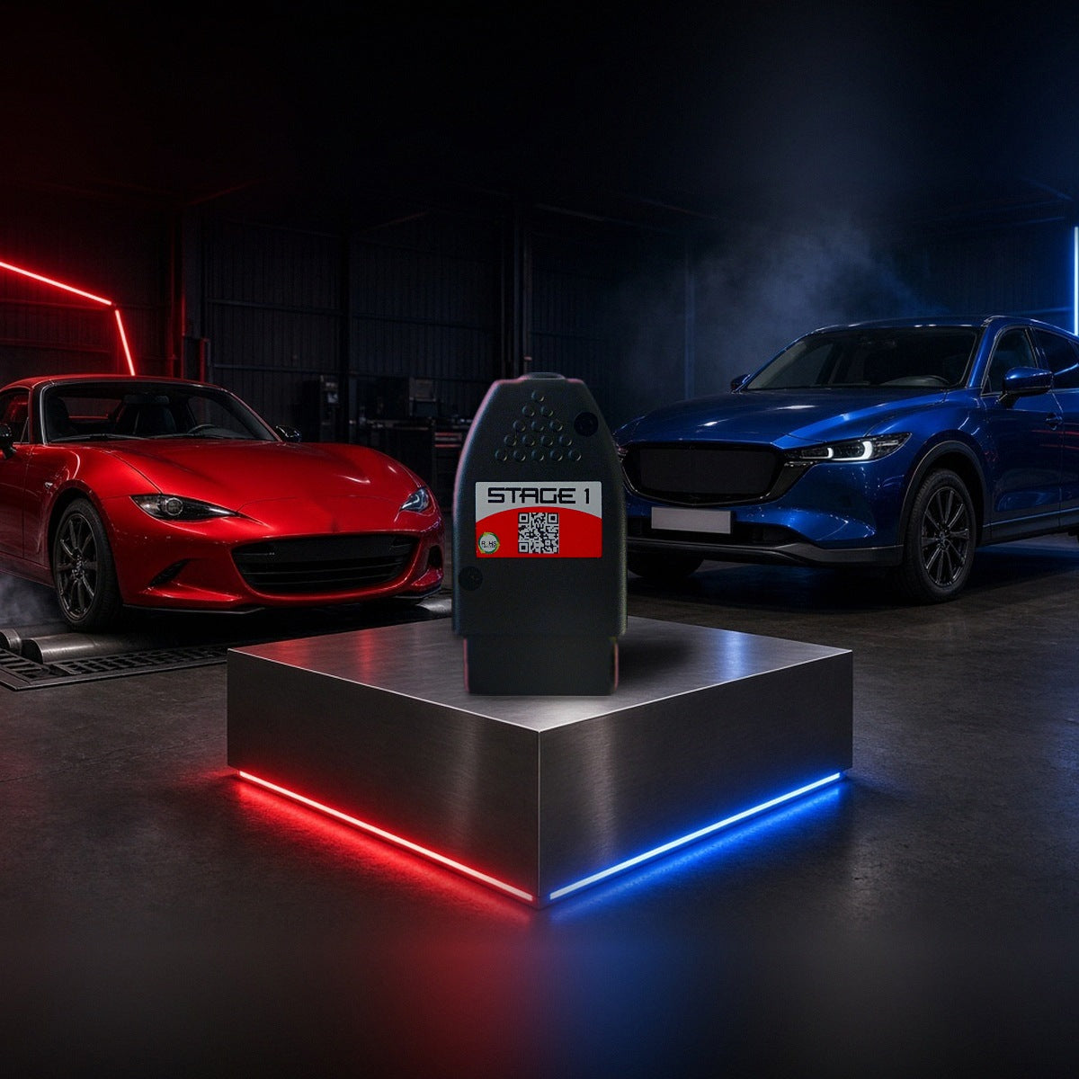 Stage 1 performance chip on a pedestal with a Mazda MX-5 Miata and CX-5 in a dyno shop