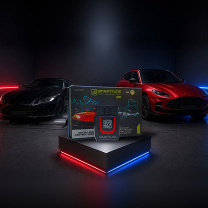 Stage 2 SmartTune performance chip on a pedestal with an Aston Martin Vantage and DBX in a dyno shop