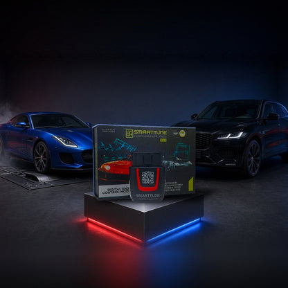 Stage 2 SmartTune performance chip on a pedestal with a Jaguar F-Type and F-Pace in a dyno shop