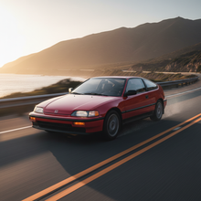 Square image of a  Honda CRX-SI (1988-1991) driving fast down the road, showing speed and excitement