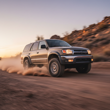 Square image of a Toyota 4Runner (1996-1998) driving fast showing speed an excitement